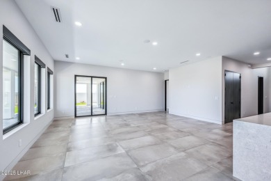 Located at 2446 E La Mancha in the prestigious gated community on Los Lagos Golf Club in Arizona - for sale on GolfHomes.com, golf home, golf lot