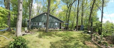 You truly can have it all!   Lakefront Luxury Meets Serene on Faulkwood Shores Golf Course in Michigan - for sale on GolfHomes.com, golf home, golf lot