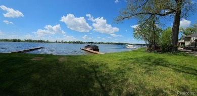 You truly can have it all!   Lakefront Luxury Meets Serene on Faulkwood Shores Golf Course in Michigan - for sale on GolfHomes.com, golf home, golf lot