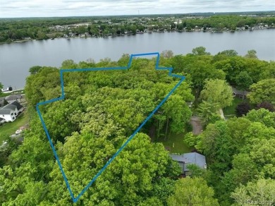 You truly can have it all!   Lakefront Luxury Meets Serene on Faulkwood Shores Golf Course in Michigan - for sale on GolfHomes.com, golf home, golf lot