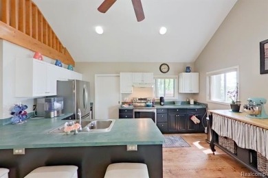 You truly can have it all!   Lakefront Luxury Meets Serene on Faulkwood Shores Golf Course in Michigan - for sale on GolfHomes.com, golf home, golf lot