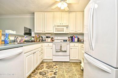 Top Floor End Unit Condo in Crow Creek, Calabash, NC. Enjoy on Crow Creek Golf Club in North Carolina - for sale on GolfHomes.com, golf home, golf lot