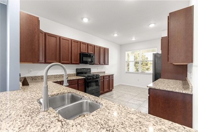 Price Dropped by $5,000!!! Welcome to this better-than-new on Candler Hills Golf and Country Club in Florida - for sale on GolfHomes.com, golf home, golf lot