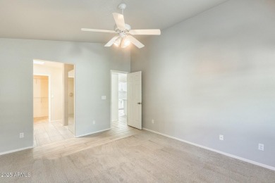 Updated Taos split plan. OWNED SOLAR. Paver driveway and on Sun Village Golf Course in Arizona - for sale on GolfHomes.com, golf home, golf lot