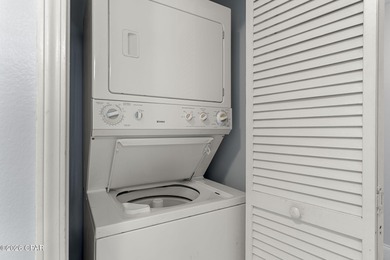 Wake up to serene lake views and step into the heart of on Signal Hill Golf Course, Inc. in Florida - for sale on GolfHomes.com, golf home, golf lot