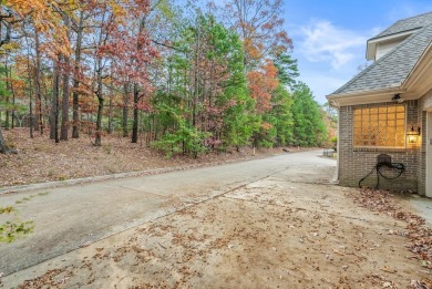 By Hole 3 of Chenal's Founders golf course, this impressive 5 on Chenal Country Club - Bear Den Mountain in Arkansas - for sale on GolfHomes.com, golf home, golf lot