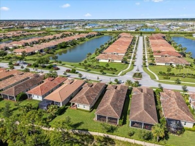 Beautifully maintained 2BR + den, 2BA home located in the gated on PGA Golf Club in PGA Village in Florida - for sale on GolfHomes.com, golf home, golf lot