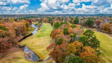 By Hole 3 of Chenal's Founders golf course, this impressive 5 on Chenal Country Club - Bear Den Mountain in Arkansas - for sale on GolfHomes.com, golf home, golf lot