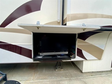 This luxurious 40-foot quadruple slide Grand Teton Limited RV is on Outdoor Resorts/Palm Springs in California - for sale on GolfHomes.com, golf home, golf lot