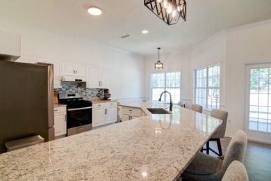 Welcome to this beautifully updated 4-bedroom, 2.5-bathroom home on Haile Plantation Golf and Country Club in Florida - for sale on GolfHomes.com, golf home, golf lot
