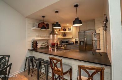 It's your time to enjoy maintenance free living at the coast in on Sea Trail Golf Resort in North Carolina - for sale on GolfHomes.com, golf home, golf lot