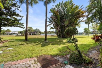Completely remodeled in 2023, this 2-bedroom, 2.5-bath lakefront on Palm-Aire Country Club and Resort - Palms in Florida - for sale on GolfHomes.com, golf home, golf lot