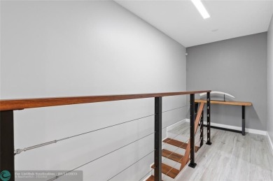 Completely remodeled in 2023, this 2-bedroom, 2.5-bath lakefront on Palm-Aire Country Club and Resort - Palms in Florida - for sale on GolfHomes.com, golf home, golf lot