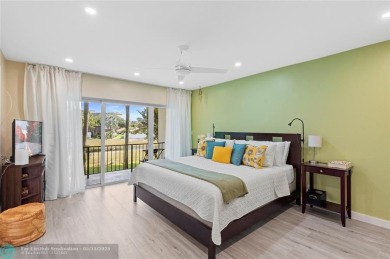 Completely remodeled in 2023, this 2-bedroom, 2.5-bath lakefront on Palm-Aire Country Club and Resort - Palms in Florida - for sale on GolfHomes.com, golf home, golf lot