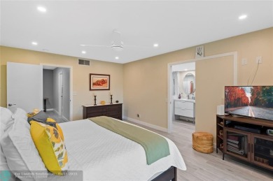 Completely remodeled in 2023, this 2-bedroom, 2.5-bath lakefront on Palm-Aire Country Club and Resort - Palms in Florida - for sale on GolfHomes.com, golf home, golf lot
