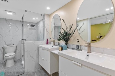 Completely remodeled in 2023, this 2-bedroom, 2.5-bath lakefront on Palm-Aire Country Club and Resort - Palms in Florida - for sale on GolfHomes.com, golf home, golf lot