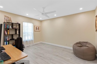Completely remodeled in 2023, this 2-bedroom, 2.5-bath lakefront on Palm-Aire Country Club and Resort - Palms in Florida - for sale on GolfHomes.com, golf home, golf lot