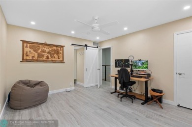 Completely remodeled in 2023, this 2-bedroom, 2.5-bath lakefront on Palm-Aire Country Club and Resort - Palms in Florida - for sale on GolfHomes.com, golf home, golf lot