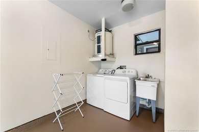 Located on a cul de sac this home offers privacy and all of the on Eagle Wood Golf Course in Florida - for sale on GolfHomes.com, golf home, golf lot