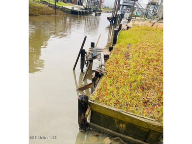 Stunning waterfront location with quick access to the Jourdan on The Bridges Golf Club At Hollywood Casino in Mississippi - for sale on GolfHomes.com, golf home, golf lot