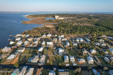 Stunning waterfront location with quick access to the Jourdan on The Bridges Golf Club At Hollywood Casino in Mississippi - for sale on GolfHomes.com, golf home, golf lot