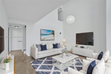 MOTIVATED SELLER!! Rare Bayfront Townhome with 30ft Boat Dock in on Normandy Shores Golf Course in Florida - for sale on GolfHomes.com, golf home, golf lot