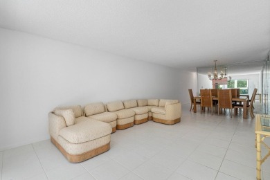 Best priced unit with impact windows! Stunning waterfront 2 on Wynmoor Golf Course in Florida - for sale on GolfHomes.com, golf home, golf lot
