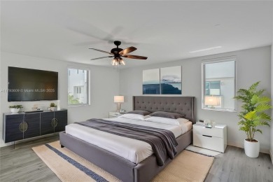 MOTIVATED SELLER!! Rare Bayfront Townhome with 30ft Boat Dock in on Normandy Shores Golf Course in Florida - for sale on GolfHomes.com, golf home, golf lot
