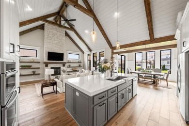 Welcome to this exceptional reverse 1.5-story walkout home in on Fred Arbanas Golf Course At Longview Lakes - Longview Lake in Missouri - for sale on GolfHomes.com, golf home, golf lot