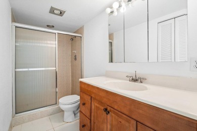 Best priced unit with impact windows! Stunning waterfront 2 on Wynmoor Golf Course in Florida - for sale on GolfHomes.com, golf home, golf lot