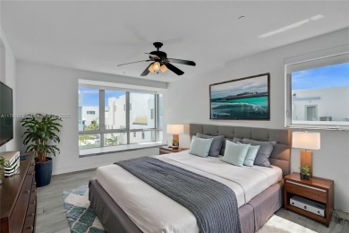 MOTIVATED SELLER!! Rare Bayfront Townhome with 30ft Boat Dock in on Normandy Shores Golf Course in Florida - for sale on GolfHomes.com, golf home, golf lot