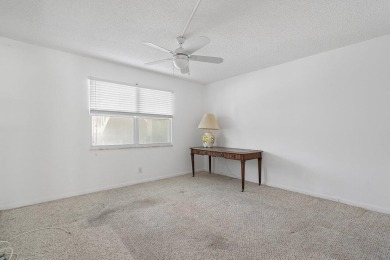 Best priced unit with impact windows! Stunning waterfront 2 on Wynmoor Golf Course in Florida - for sale on GolfHomes.com, golf home, golf lot