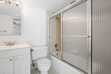 Best priced unit with impact windows! Stunning waterfront 2 on Wynmoor Golf Course in Florida - for sale on GolfHomes.com, golf home, golf lot