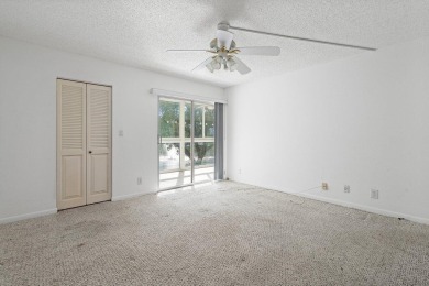 Best priced unit with impact windows! Stunning waterfront 2 on Wynmoor Golf Course in Florida - for sale on GolfHomes.com, golf home, golf lot