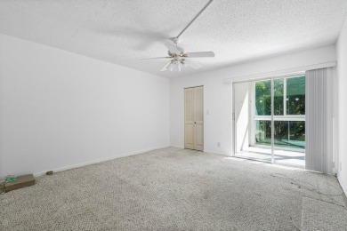Best priced unit with impact windows! Stunning waterfront 2 on Wynmoor Golf Course in Florida - for sale on GolfHomes.com, golf home, golf lot