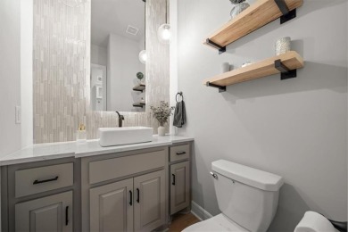 Welcome to this exceptional reverse 1.5-story walkout home in on Fred Arbanas Golf Course At Longview Lakes - Longview Lake in Missouri - for sale on GolfHomes.com, golf home, golf lot