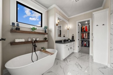 Welcome to this exceptional reverse 1.5-story walkout home in on Fred Arbanas Golf Course At Longview Lakes - Longview Lake in Missouri - for sale on GolfHomes.com, golf home, golf lot