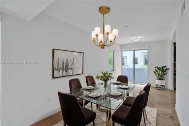 MOTIVATED SELLER!! Rare Bayfront Townhome with 30ft Boat Dock in on Normandy Shores Golf Course in Florida - for sale on GolfHomes.com, golf home, golf lot
