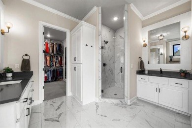 Welcome to this exceptional reverse 1.5-story walkout home in on Fred Arbanas Golf Course At Longview Lakes - Longview Lake in Missouri - for sale on GolfHomes.com, golf home, golf lot