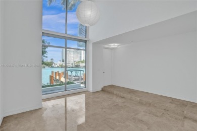 MOTIVATED SELLER!! Rare Bayfront Townhome with 30ft Boat Dock in on Normandy Shores Golf Course in Florida - for sale on GolfHomes.com, golf home, golf lot