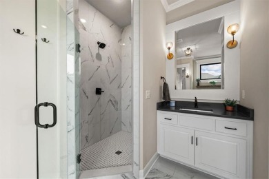 Welcome to this exceptional reverse 1.5-story walkout home in on Fred Arbanas Golf Course At Longview Lakes - Longview Lake in Missouri - for sale on GolfHomes.com, golf home, golf lot