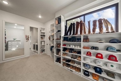 Welcome to this exceptional reverse 1.5-story walkout home in on Fred Arbanas Golf Course At Longview Lakes - Longview Lake in Missouri - for sale on GolfHomes.com, golf home, golf lot