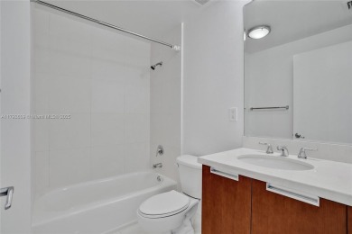 MOTIVATED SELLER!! Rare Bayfront Townhome with 30ft Boat Dock in on Normandy Shores Golf Course in Florida - for sale on GolfHomes.com, golf home, golf lot