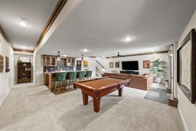 Welcome to this exceptional reverse 1.5-story walkout home in on Fred Arbanas Golf Course At Longview Lakes - Longview Lake in Missouri - for sale on GolfHomes.com, golf home, golf lot