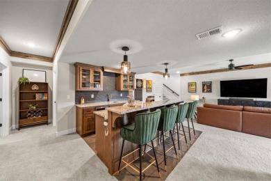 Welcome to this exceptional reverse 1.5-story walkout home in on Fred Arbanas Golf Course At Longview Lakes - Longview Lake in Missouri - for sale on GolfHomes.com, golf home, golf lot