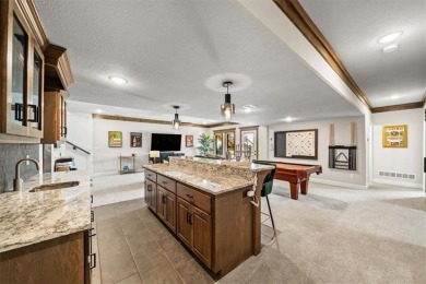 Welcome to this exceptional reverse 1.5-story walkout home in on Fred Arbanas Golf Course At Longview Lakes - Longview Lake in Missouri - for sale on GolfHomes.com, golf home, golf lot