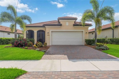 Welcome to 24076 Spartina Drive, a stunning residence nestled in on Sarasota National Golf Club in Florida - for sale on GolfHomes.com, golf home, golf lot