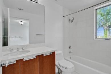 MOTIVATED SELLER!! Rare Bayfront Townhome with 30ft Boat Dock in on Normandy Shores Golf Course in Florida - for sale on GolfHomes.com, golf home, golf lot