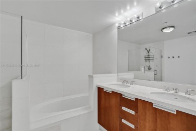 MOTIVATED SELLER!! Rare Bayfront Townhome with 30ft Boat Dock in on Normandy Shores Golf Course in Florida - for sale on GolfHomes.com, golf home, golf lot