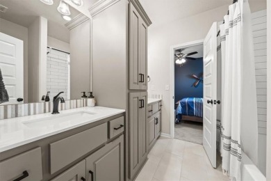 Welcome to this exceptional reverse 1.5-story walkout home in on Fred Arbanas Golf Course At Longview Lakes - Longview Lake in Missouri - for sale on GolfHomes.com, golf home, golf lot